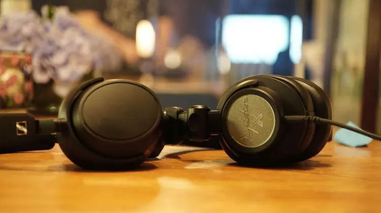 Drop + Ultrasone Signature X beside Sennheiser Momentum 4 Wireless