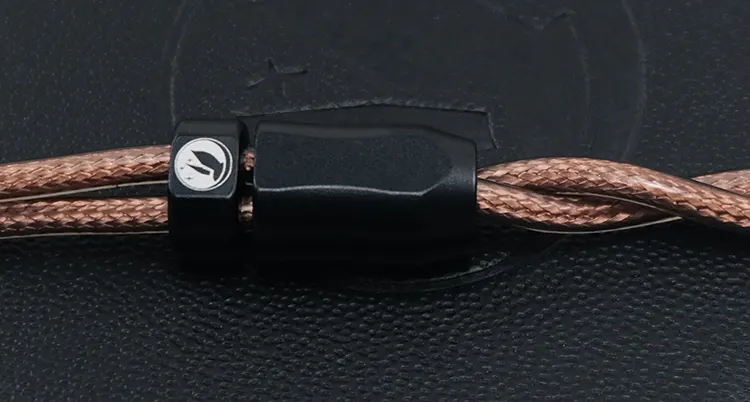 FIR Audio E12 stock cable on black leather background