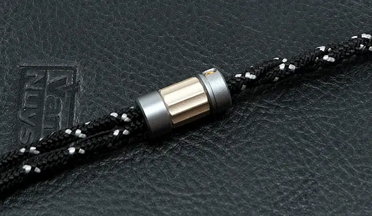 Satin Audio Hera cable on black leather