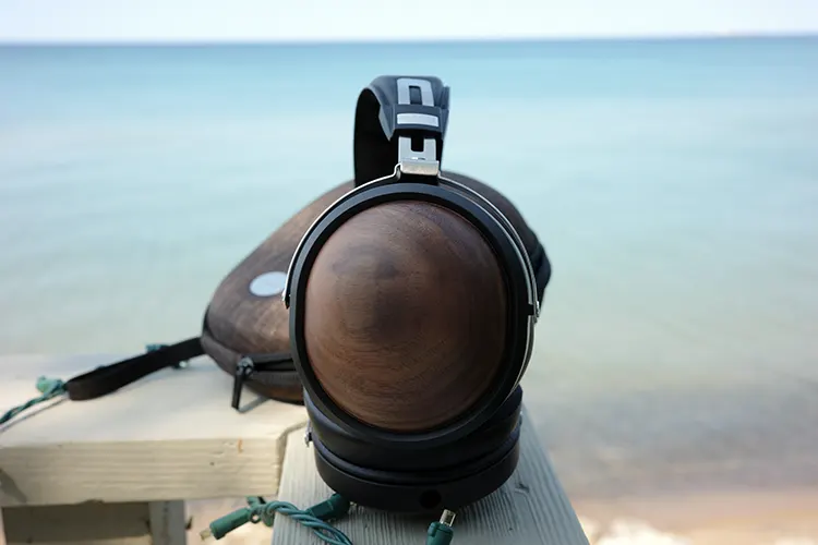 FiiO FT1 wooden cups on a bench by the sea