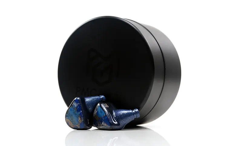 PMG Audio Apx SE shells beside black carry tin