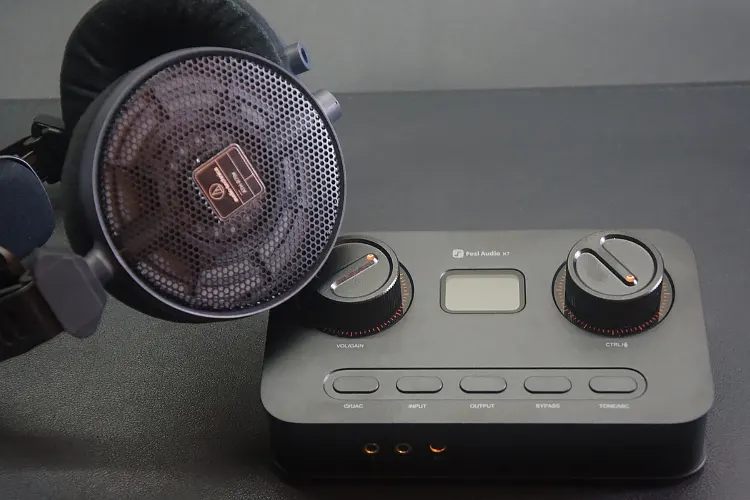Fosi Audio K7 with Audio-Technica R70X headphones on top