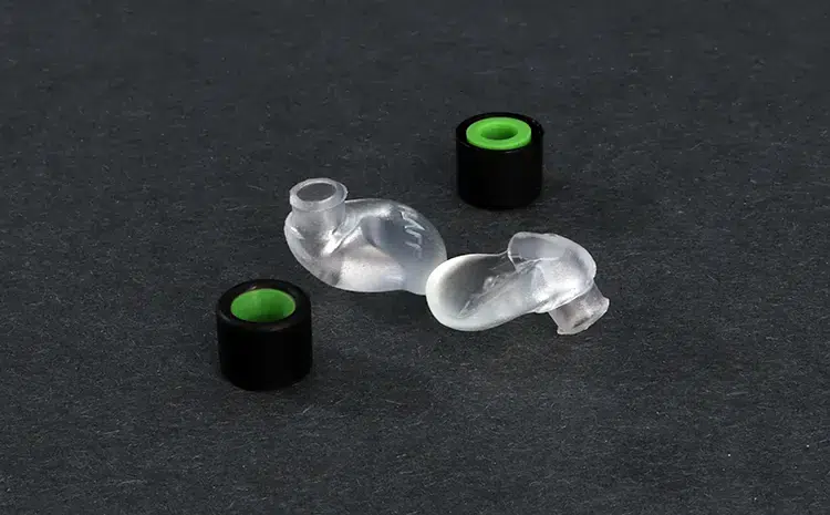 Flare Audio Definition beside green ear tips