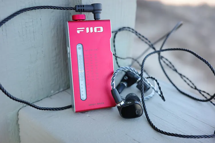 FiiO RR11 beside Drop Campfire Audio Dark Star IEMs
