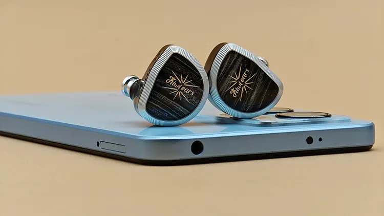 Kiwi Ears Aether on top of smartphone