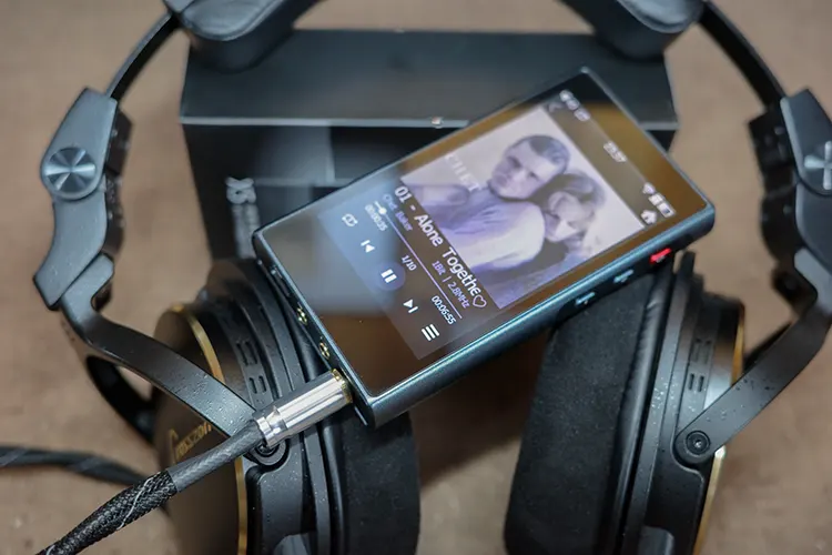 xDuoo X5 on top of Crosszone CZ-8A Enhanced headphones