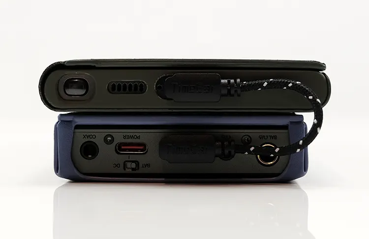 Cayin RU9 stacked under a Samsung S23 Ultra