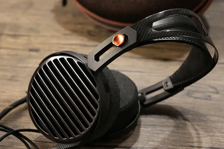 FiiO FT7 headphones on wood bench