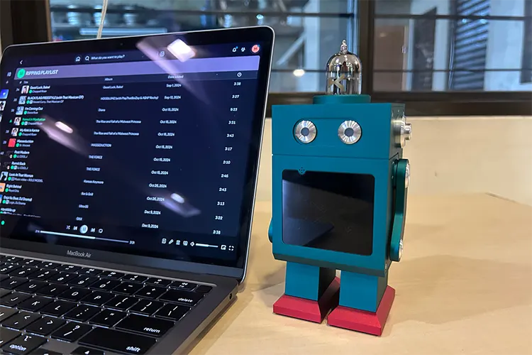 xDuoo DM-01 beside MacBook Pro