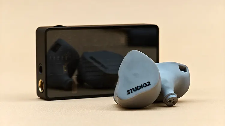 Softears Studio 2 beside Heartfield R1 dongle