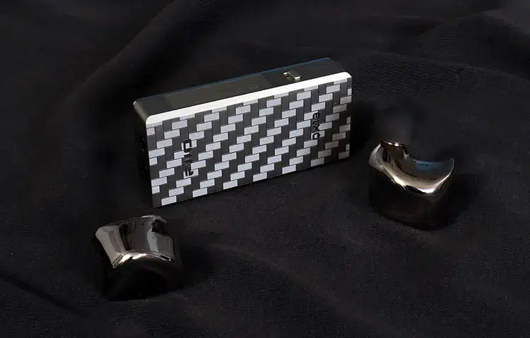 FiiO QX13 beside FiiO earphones