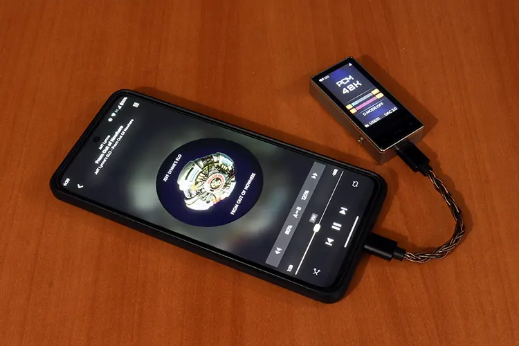 FiiO QX13 connected to a smartphone
