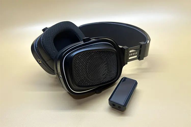 HarmonicDyne BAROQUE beside a dongle