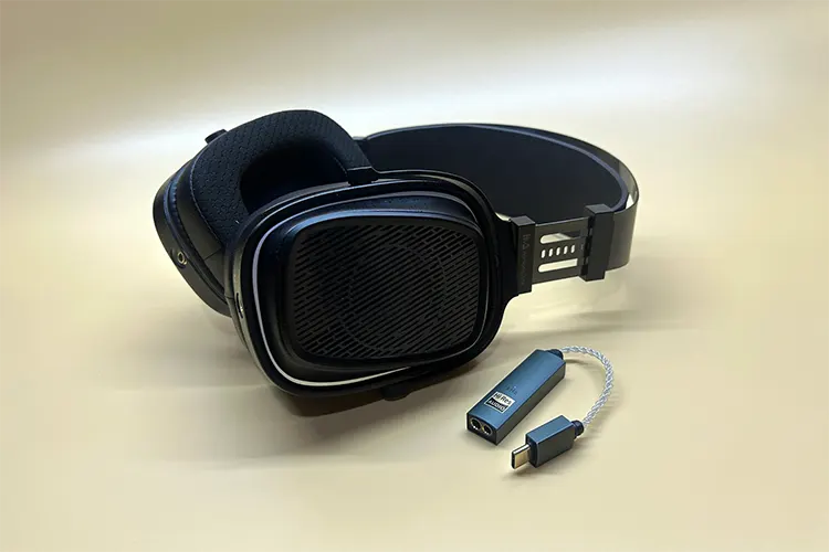 HarmonicDyne BAROQUE beside an iFi audio GO Max dongle