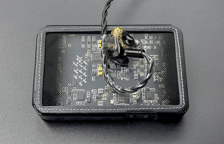 Moritz Audio ENZO on top of Questyle portable amplifier