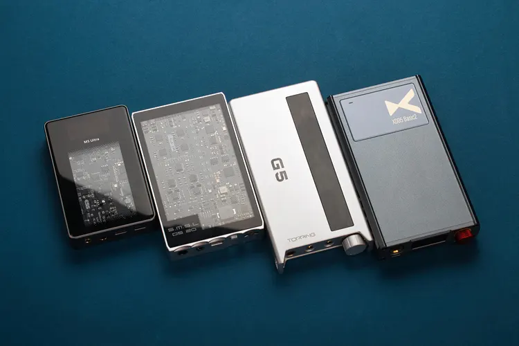 xDuoo XD05 Basic2 beside 3 other portable amps dacs