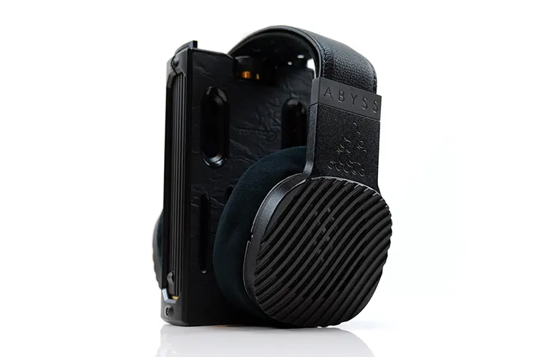 ABYSS JOAL headphones on top of Cayin C9ii portable amplifier