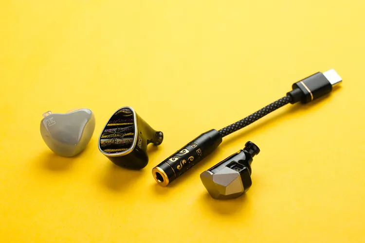 FiiO JIEZI beside 3 IEM shells