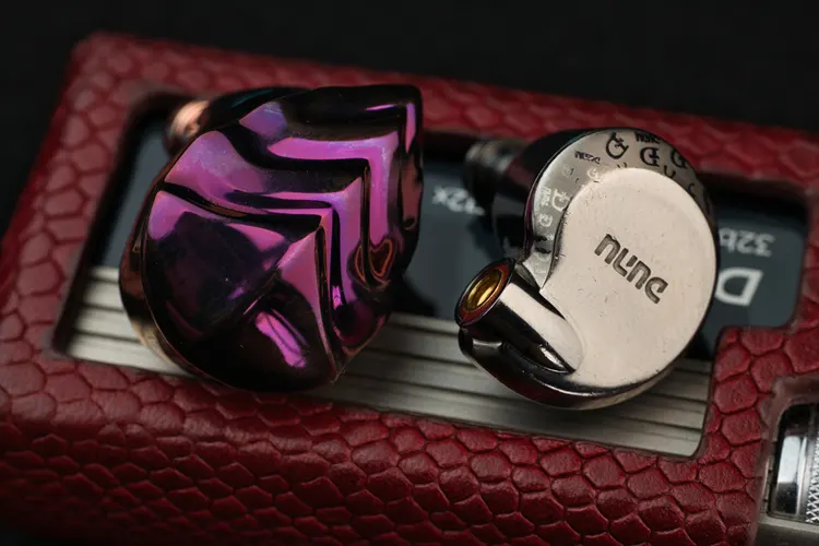 Hidizs MK12 Turris Titanium Edition IEM beside DUNU Falcon Ultra IEM