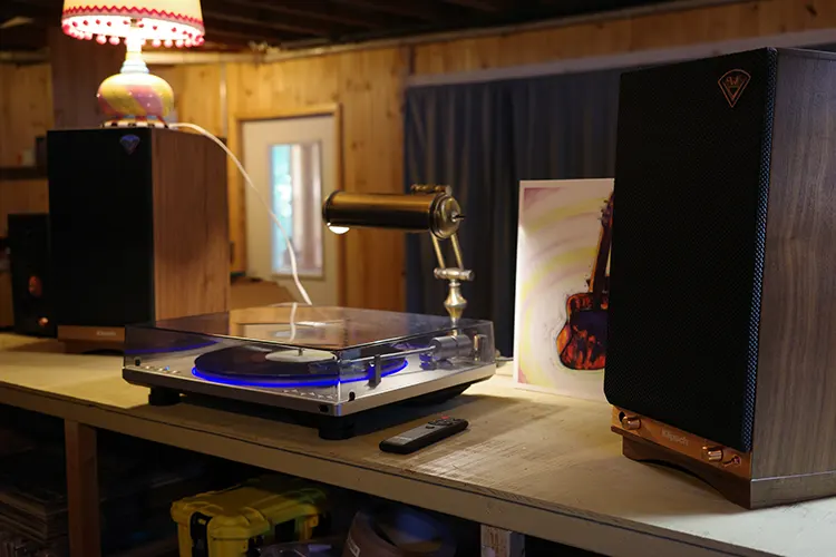 Klipsch The Sixes speakers on desktop with TT13 turntable