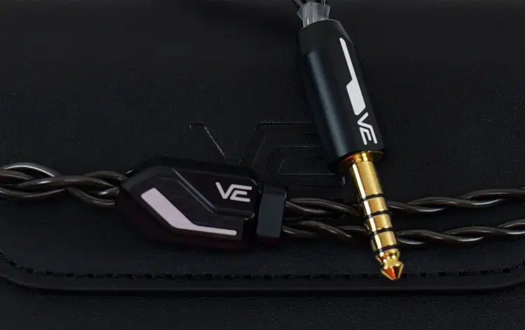 Vision Ears VE ZEN stock cable on black leather background