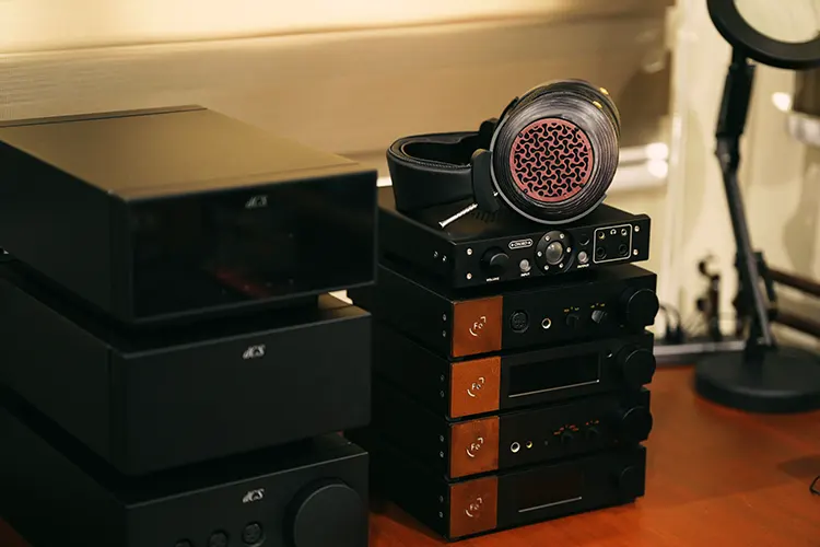 ZMF Headphones BOKEH Open on top of Chord and Ferrum amplifier stack