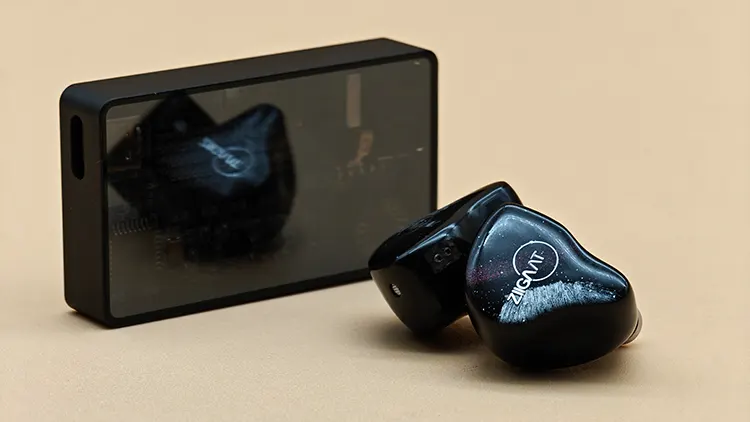 ZiiGaat Crescent shells beside the Heartfield R1 dongle DAC