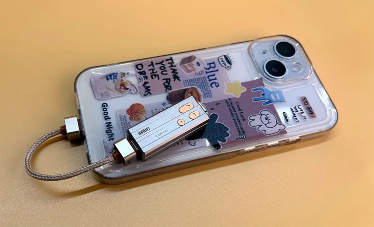 ddHiFi TC44Pro E3 dongle DAC connected to a smartphone