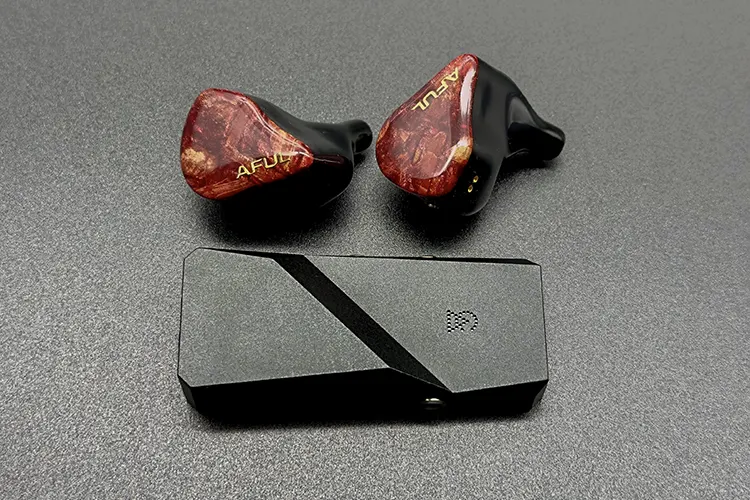 AFUL DAWN-X shells above Campfire Audio Relay dongle DAC