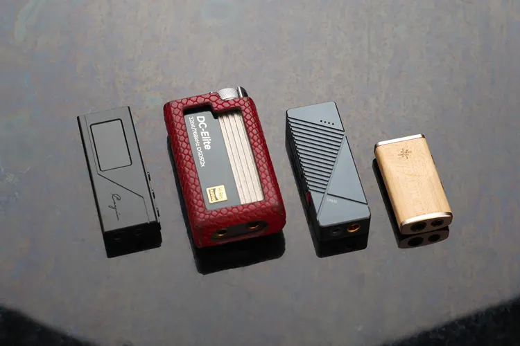 Cayin RU3 beside 3 dongle DACs