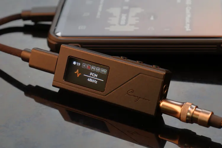 Cayin RU3 dongle DAC connected to phone with screen turned on