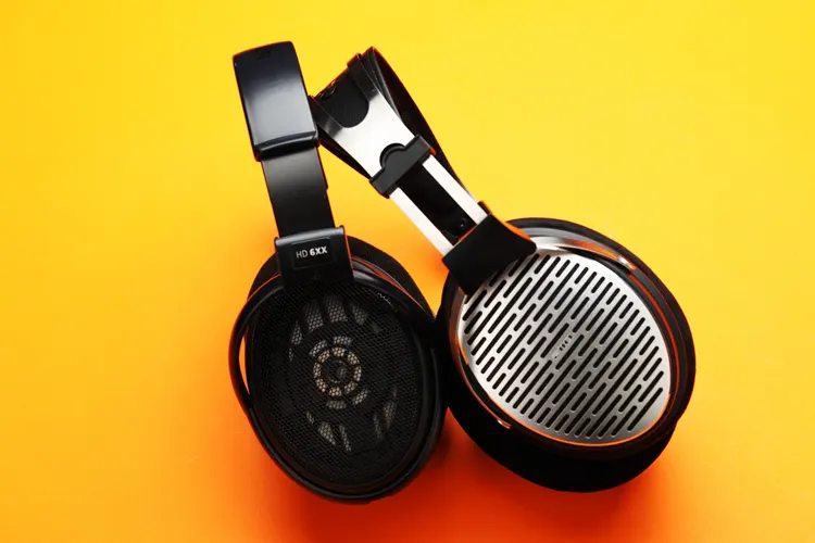 FiiO JT3 headphones beside the Sennheiser HD 6XX headphones