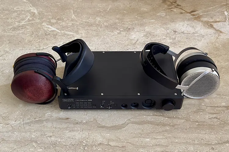 HIFIMAN HE600 and ZMF Bokeh headphones beside a Questyle CMA-18M amplifier