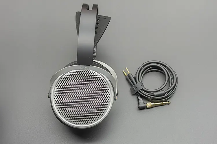 HIFIMAN HE600 headphones beside stock cable