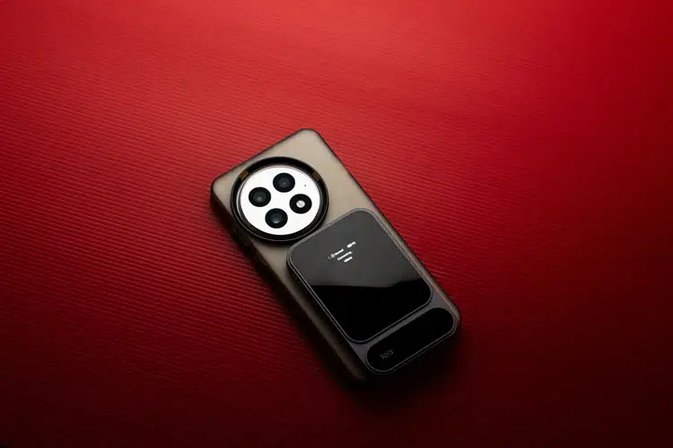 Khadas Tea Pro attached to the back of a phone