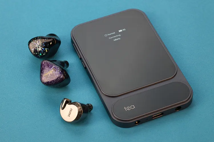 Khadas Tea Pro beside 3 IEM shells