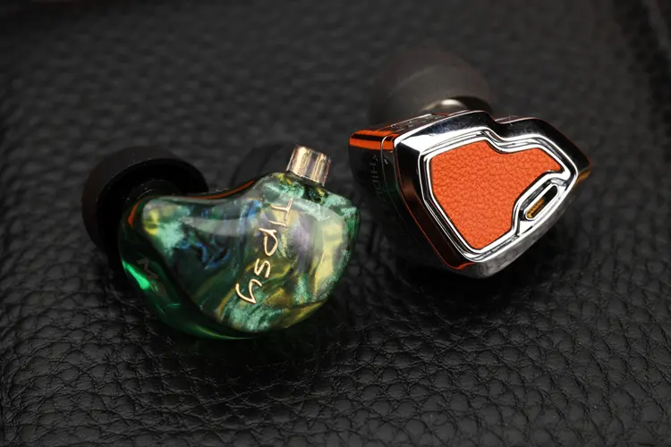 Tipsy M3 IEM shell beside the Hidizs MS2 Pro IEM shell