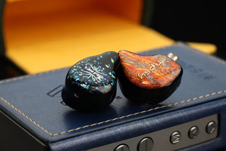 Tipsy M5 shell beside Kiwi Ears Astral shell
