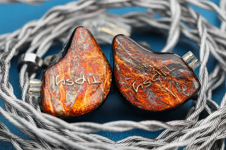 Tipsy M5 shells inside wrapped silver stock cable