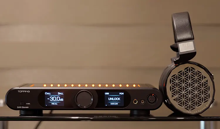 Topping DX9 Discrete amplifier with Nur Harmonia headphones on top