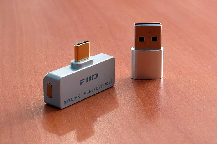 FiiO AIR LINK standing upright with USB-A adaptor