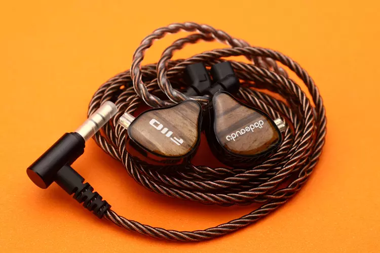 FiiO JH13 shells inside rolled up stock cable