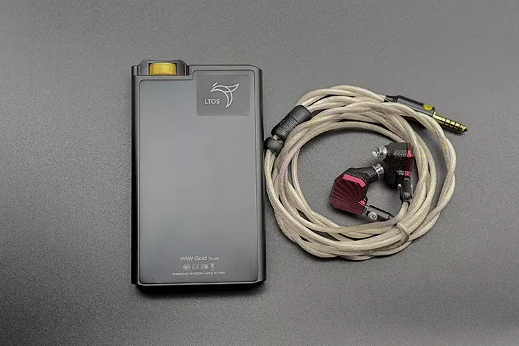 PLUSSOUND SONORA SE IEMs and cable beside Lotoo PAW Gold Touch DAP