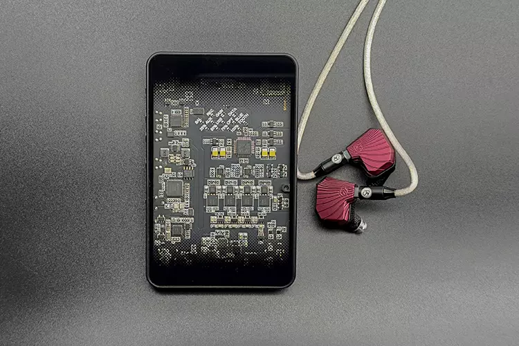 PLUSSOUND SONORA SE IEMs beside Questyle portable DAC and amplifier