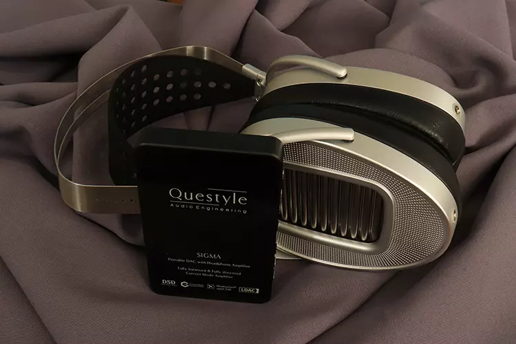 Questyle SIGMA beside HE1000 Unveiled headphones