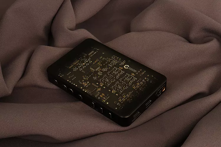 Questyle SIGMA on a satin bed