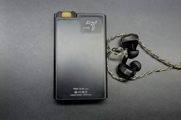 Campfire Audio Andromeda 10 beside Lotoo PAW Gold Touch DAP