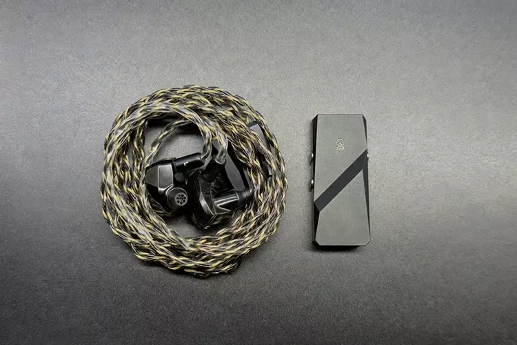 Campfire Audio Andromeda 10 beside Relay dongle DAC