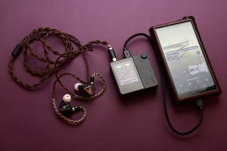 HiBy W4 connected to IEMs and a FiiO M15S DAP