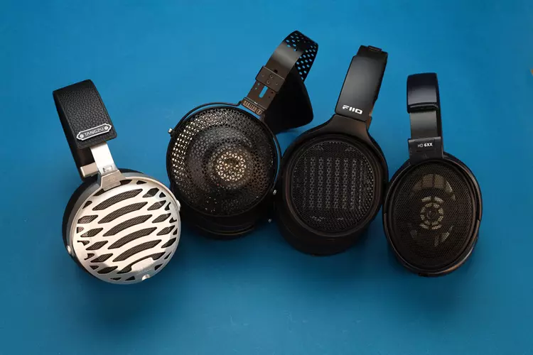 TANGZU OX Demon King beside 3 other headphones